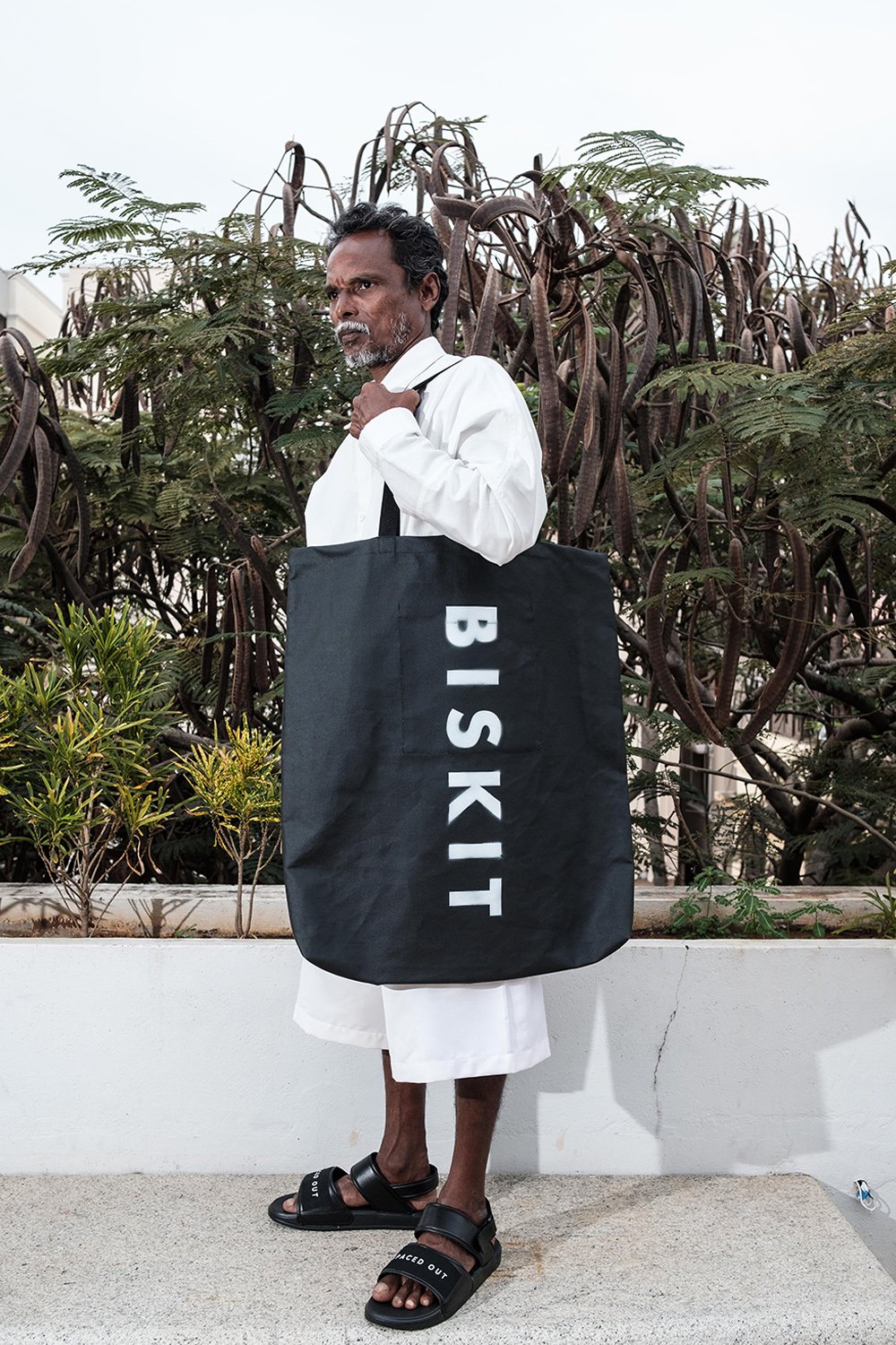 Black Biskit Tote Bag with Astro Print Panel. Hand Made. 100% Cotton. Designed in Madras, Made in India  | BISKIT UNISEX CLOTHING LABEL