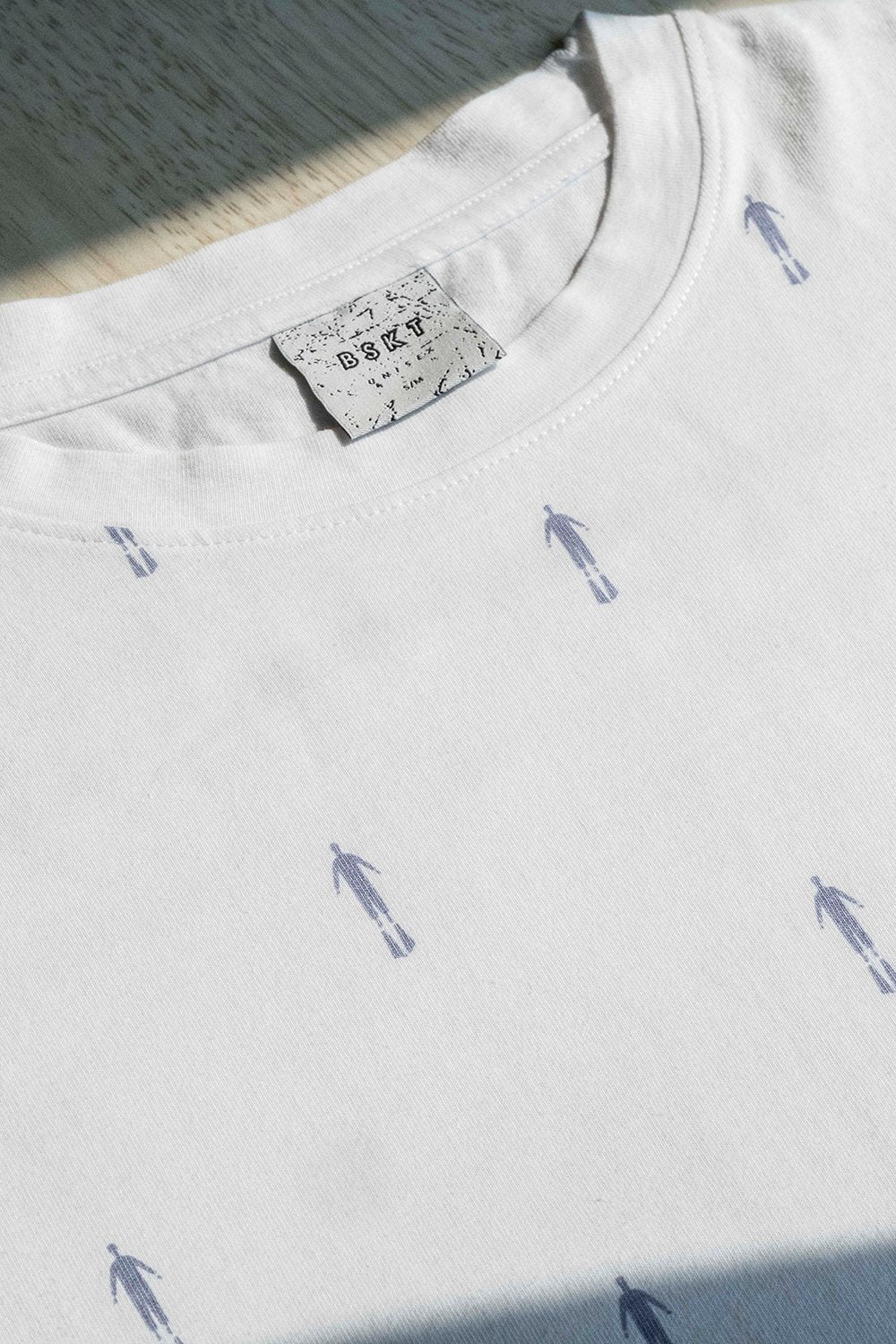 White Unisex T-shirt. Drop Shoulder. Gender-neutral fit.  Designed in Madras, Made in India  | BISKIT UNISEX CLOTHING LABEL
