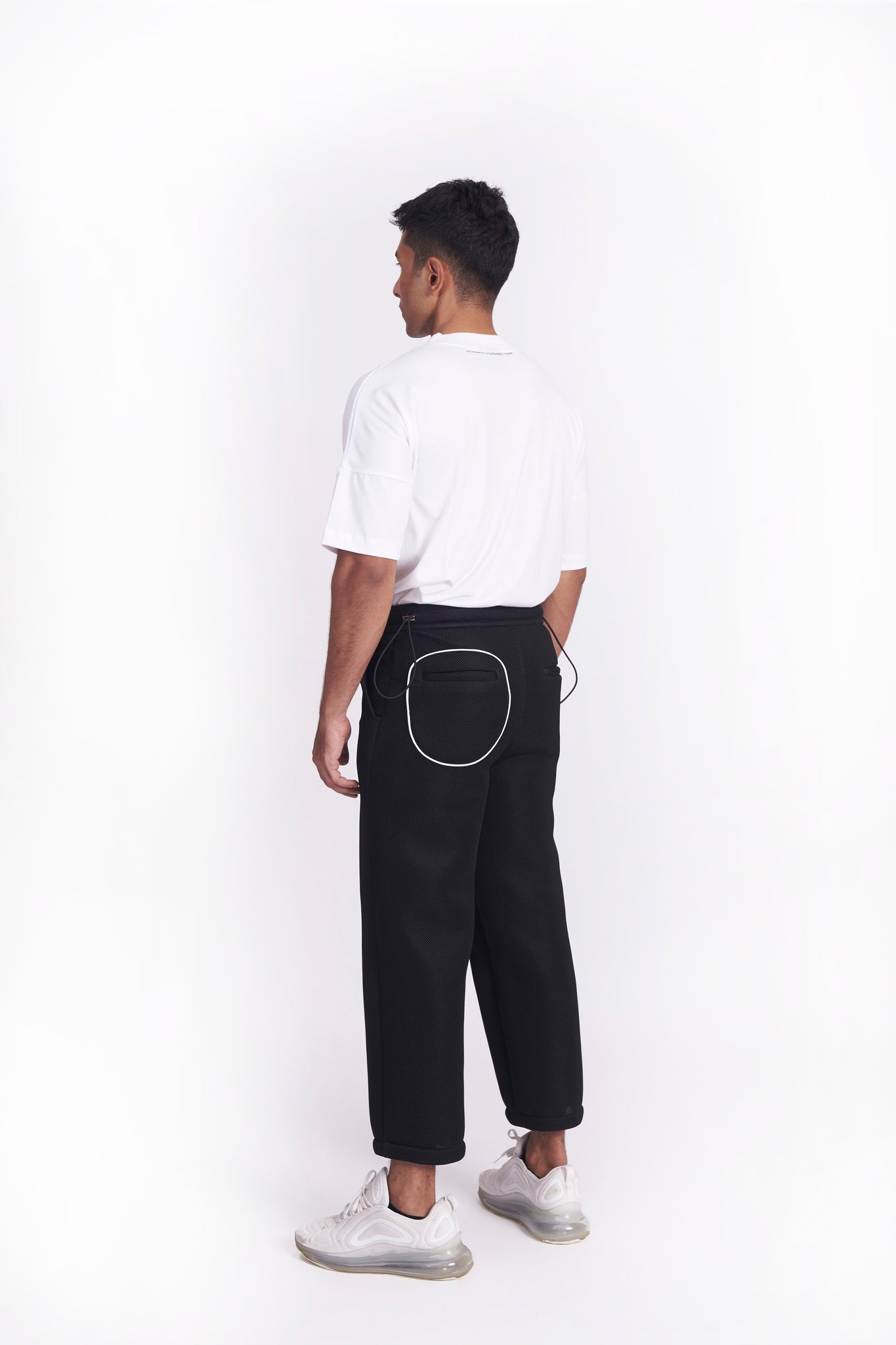 The patterns for this pant are hand drawn, hand cut and finally assembled together by our studio tailor.
