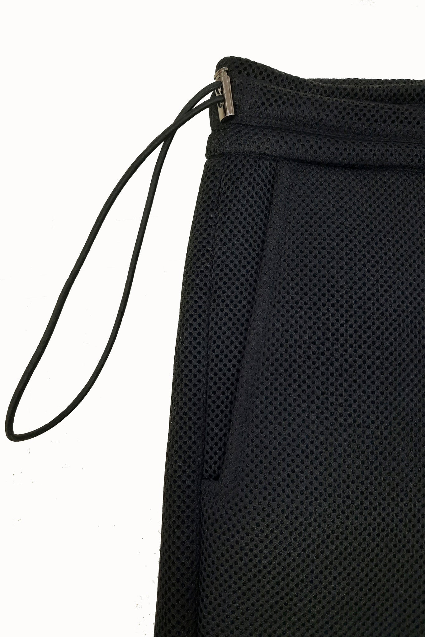  The waistband features adjustable drawstring cords.